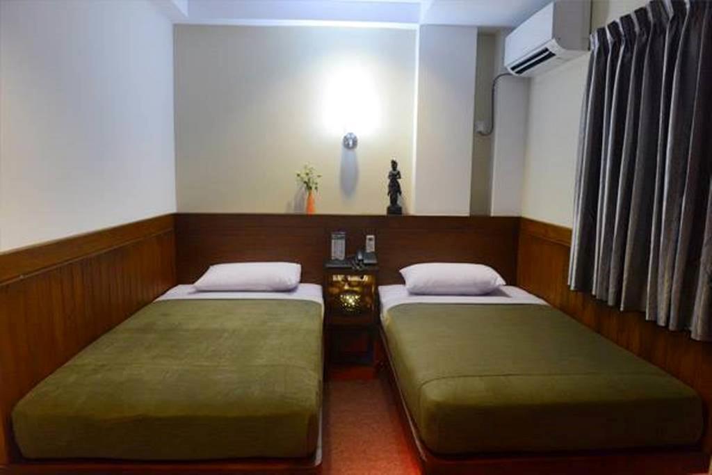 Green Paradise Hotel Yangon Chambre photo